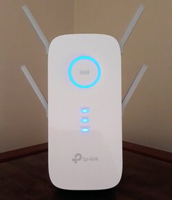 TP-Link RE650 AC2600 Wi-Fi Range Extender On Cabinet 01ss.jpg