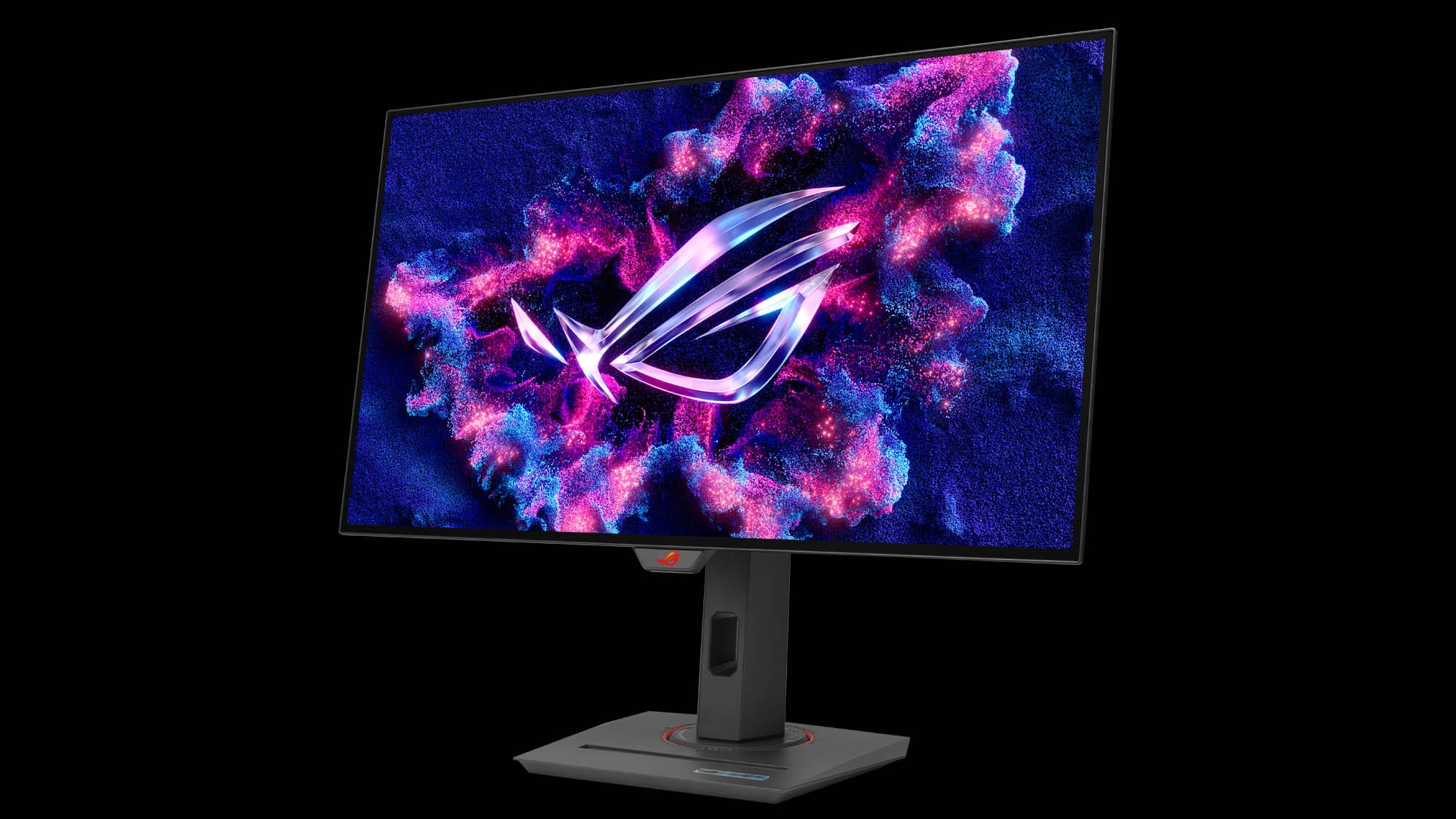 The XG27AQDMG monitor with the ROG Fearless Eye logo on screen, on a black background.